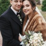 gorgeous-bride-with-bouquet-and-stylish-groom-gently-hugging.jpg