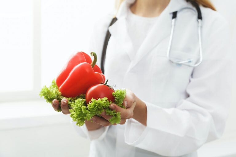 Unrecognizable nutritionist woman with vegetables