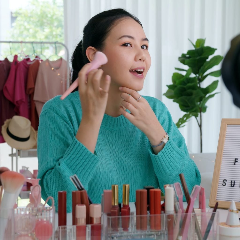 Asia woman micro influencer record live viral video camera at home studio
